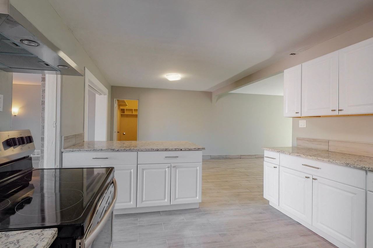 7707 Morrow Ave Ne - Photo 5 of 34