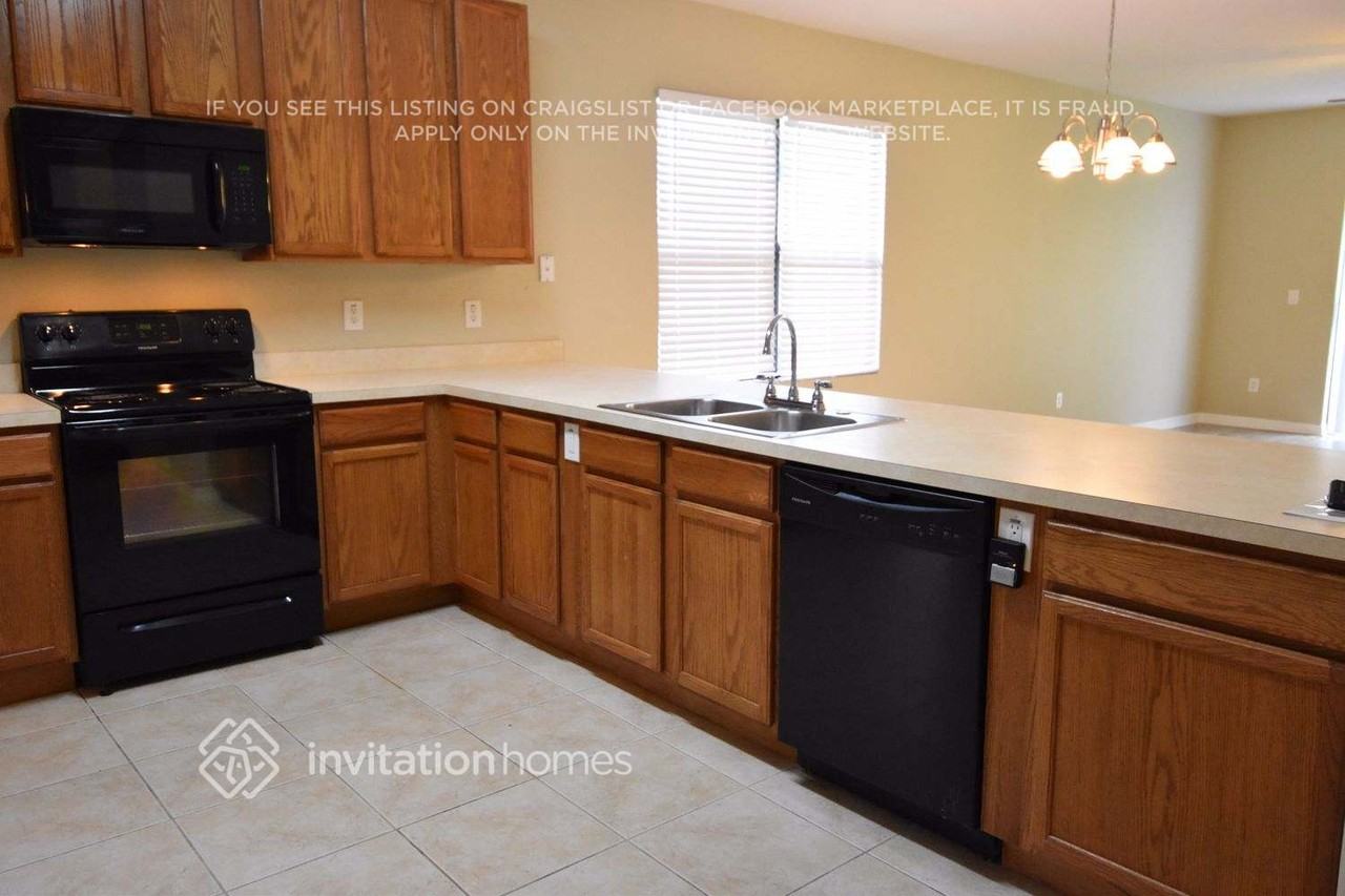 9115 Tivoli Chase Dr - Photo 5 of 13