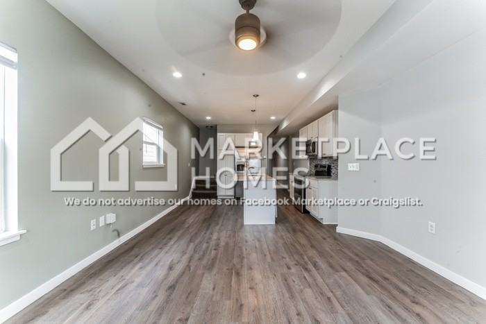 1011 Harlan St - Photo 6 of 26