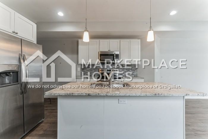 1011 Harlan St - Photo 7 of 26