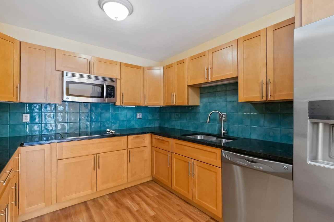 6980 East Girard Avenue, Unit 410 - Photo 7 of 42