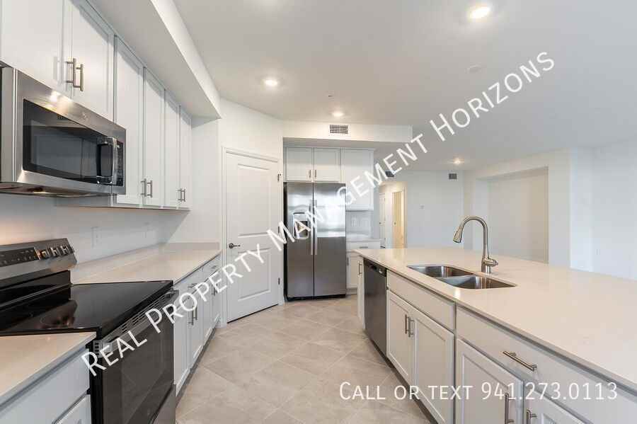 5628 Summit Pointe Cir #104 - Photo 7 of 27