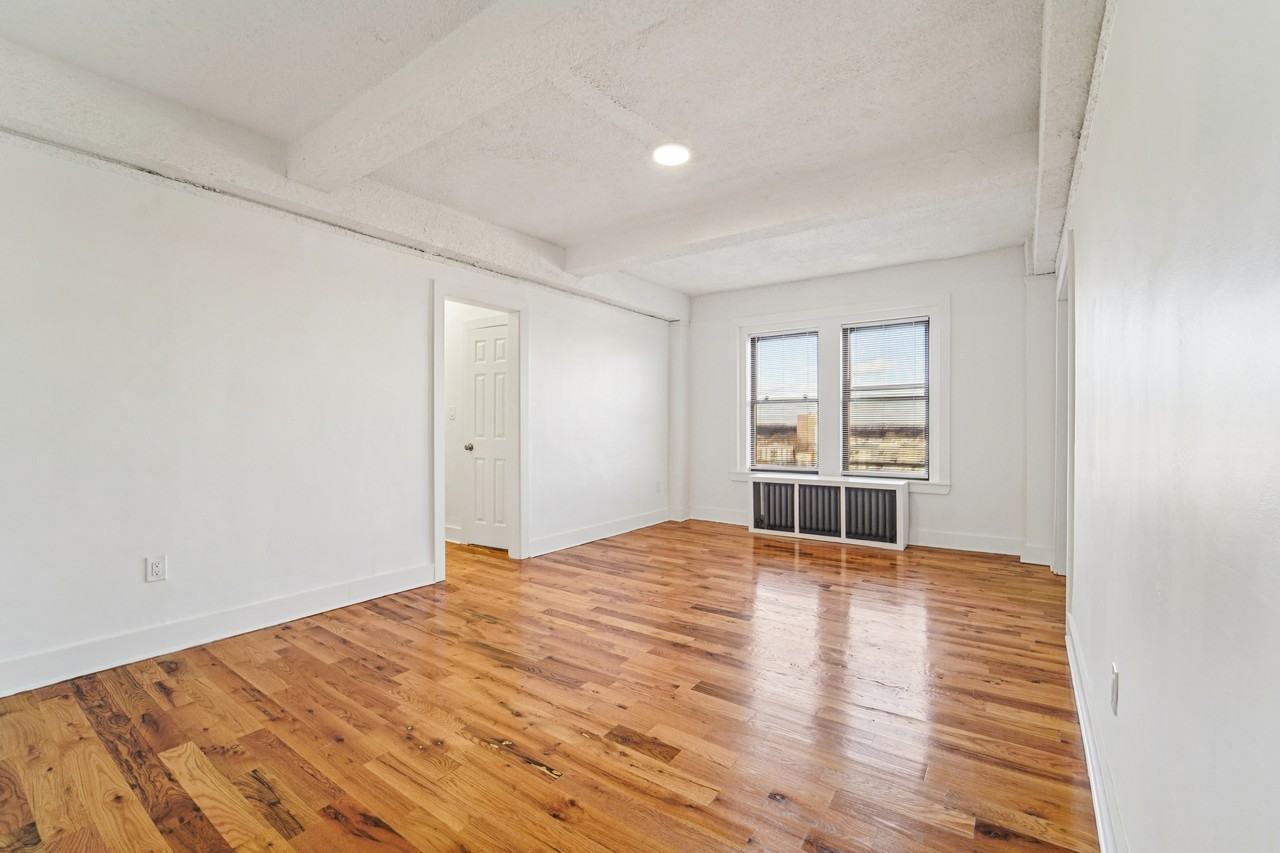 Spaxalaya 106 Harrison LLC - Photo 2 of 13