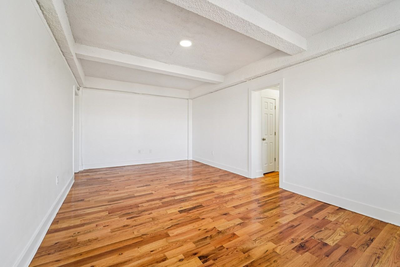 Spaxalaya 106 Harrison LLC - Photo 7 of 13