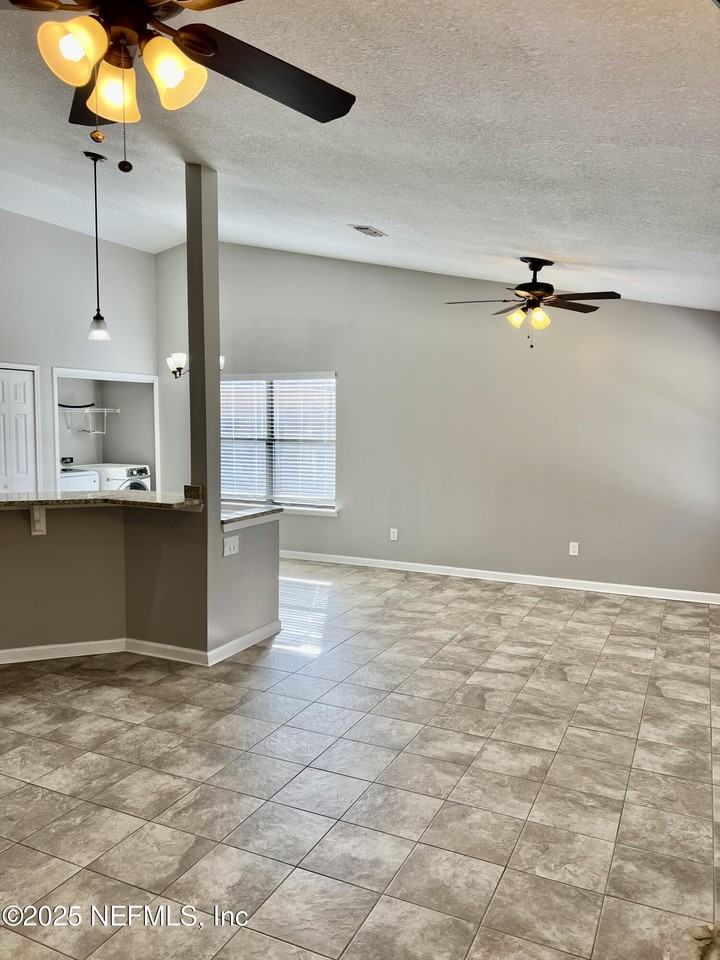 7820 Collins Ridge Blvd - Photo 4 of 17