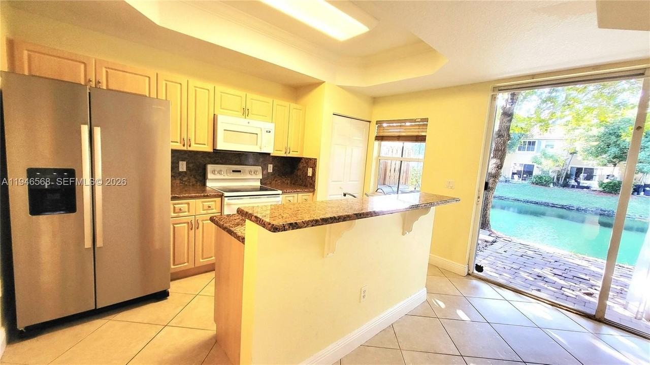 4935 Tradewinds Ter #902 - Photo 4 of 39