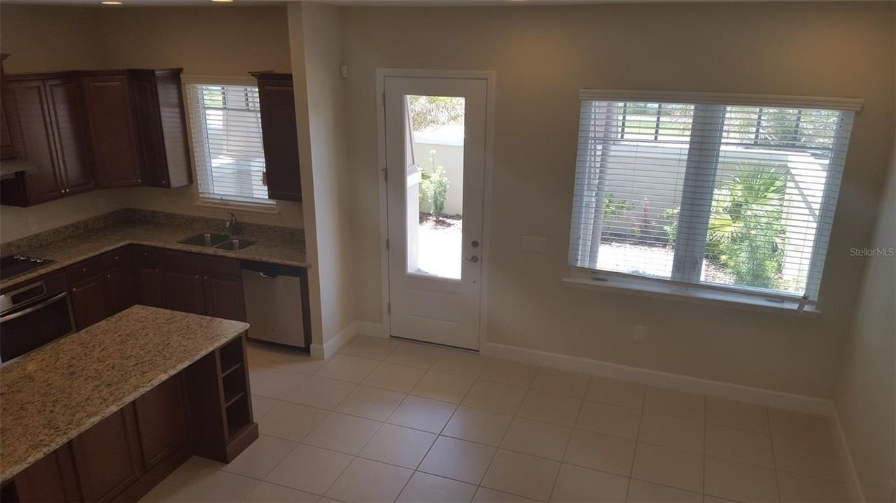 13833 Benavente Ave - Photo 7 of 42