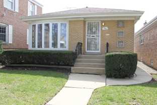 7615 W Devon Ave - Photo 1 of 1