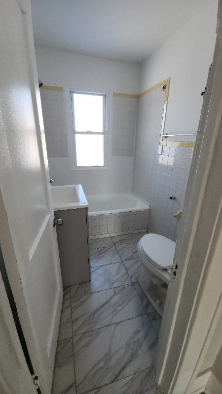 7005 Orchard Ave - Photo 7 of 9