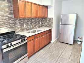 E 15th St #1 - Photo 1 of 1