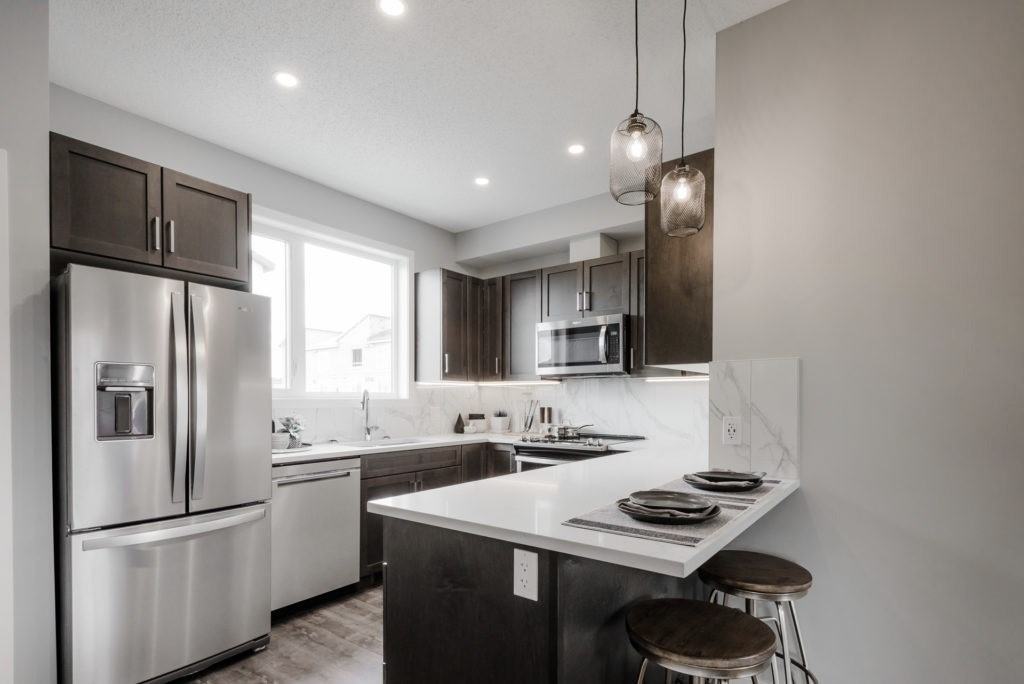 2 Bedroom + Den 2.5 Bathroom Townhouse in Belmont SW - Photo 4 of 19