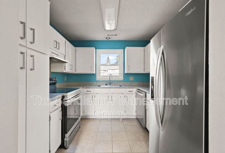 1239 Cornwallis Rd - Photo 6 of 18