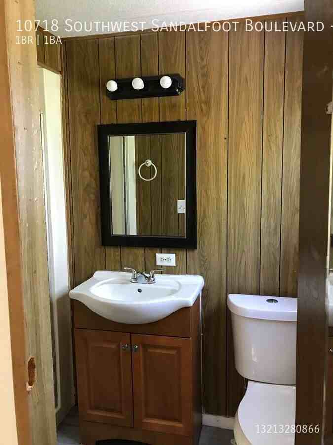 10718 Sandalfoot Blvd W #R2 - Photo 3 of 4