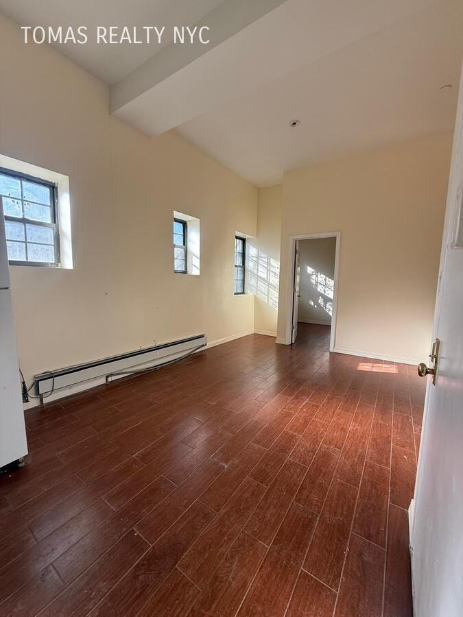 712 E 214th St - Photo 2 of 7