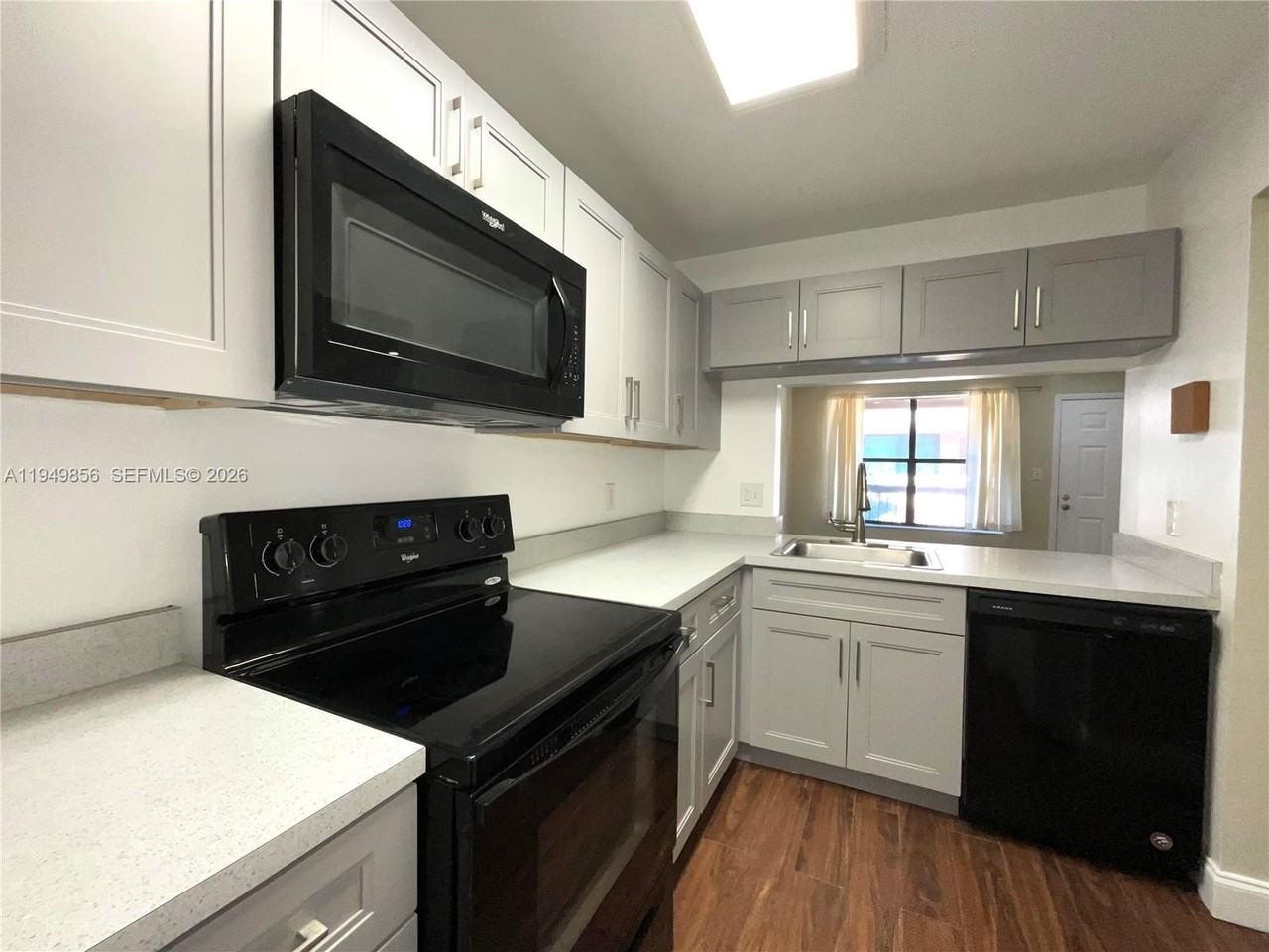 10043 Winding Lake Rd #201 - Photo 4 of 17