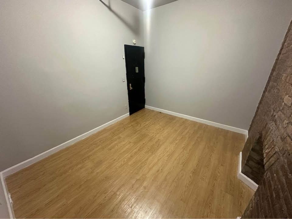 W 51st St - Photo 2 of 5