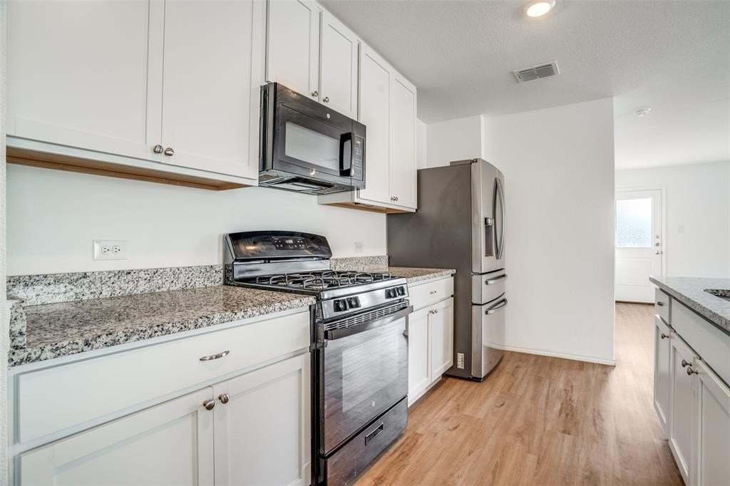 1201 Catclaw Rd - Photo 7 of 20