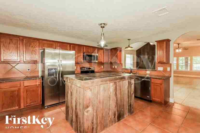 13029 Victoria Regina Dr - Photo 7 of 15