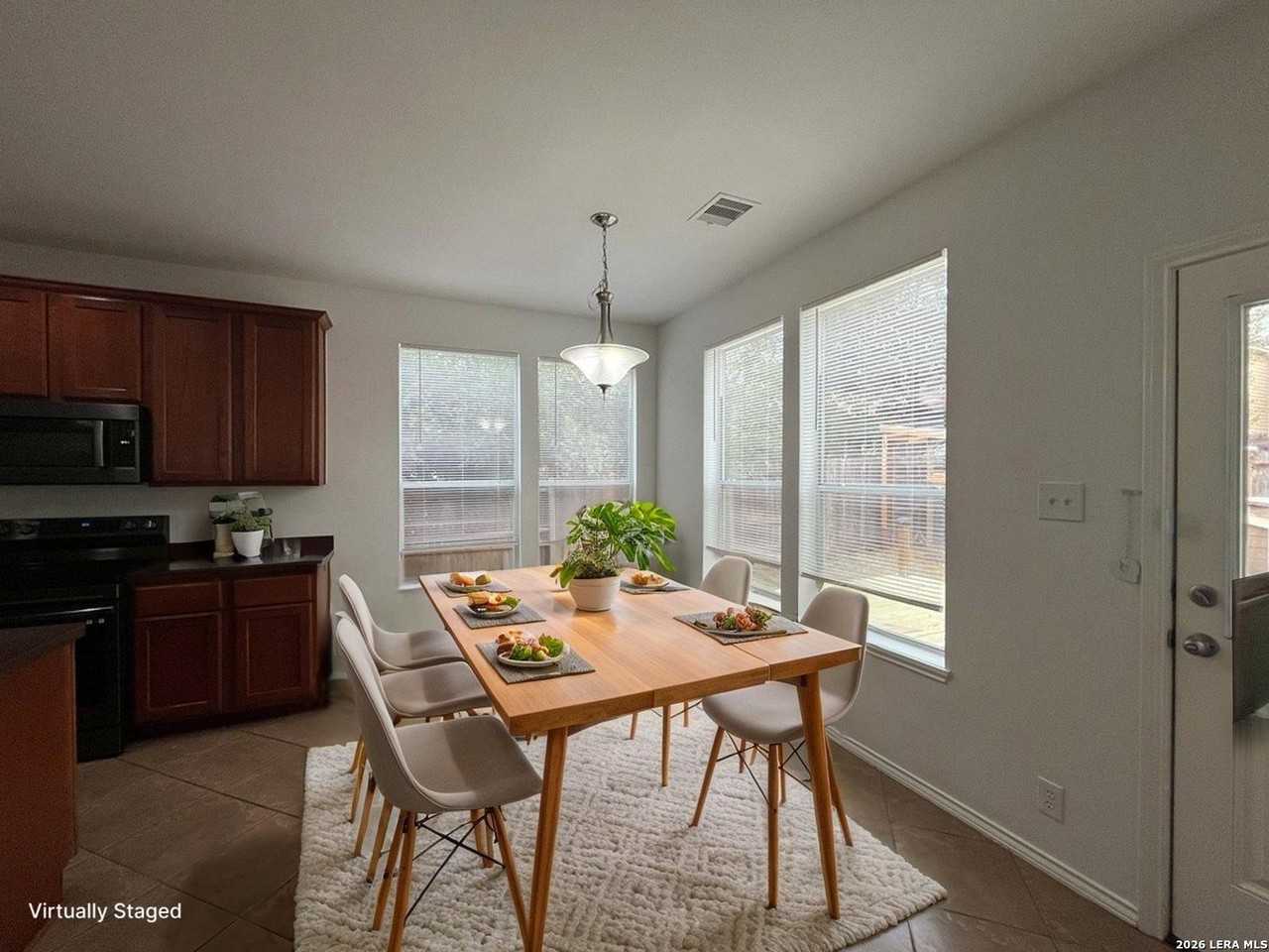 8719 Sarasota Woods - Photo 2 of 43