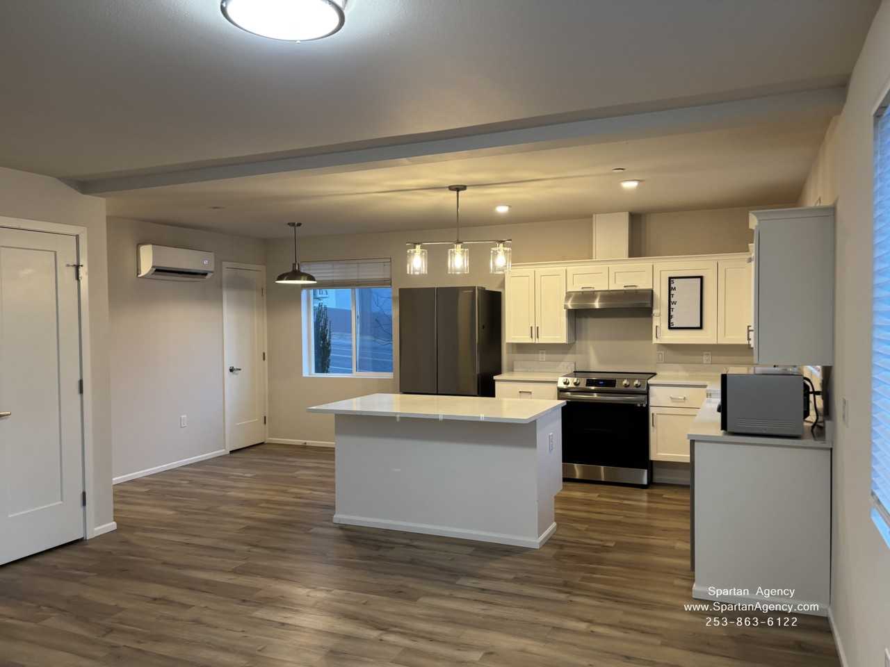 8501 Locust Ave E #102 - Photo 2 of 15