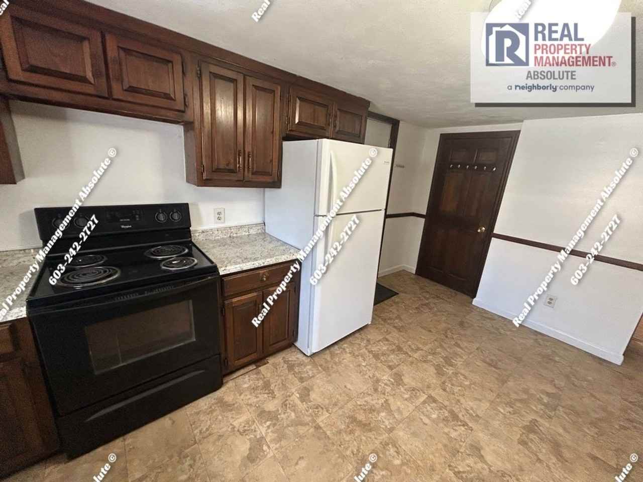 83 1/2 W Hollis St - Photo 5 of 23