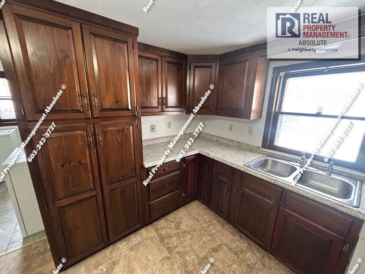 83 1/2 W Hollis St - Photo 6 of 23