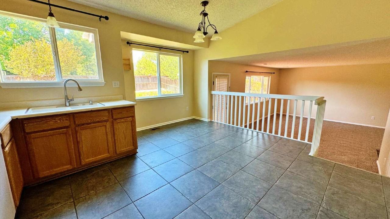 5597 S Killarney St - Photo 5 of 33