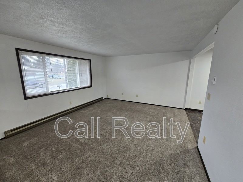 3324 S Raymond Cir - Photo 3 of 12