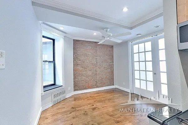 E 25th St #A - Photo 3 of 6