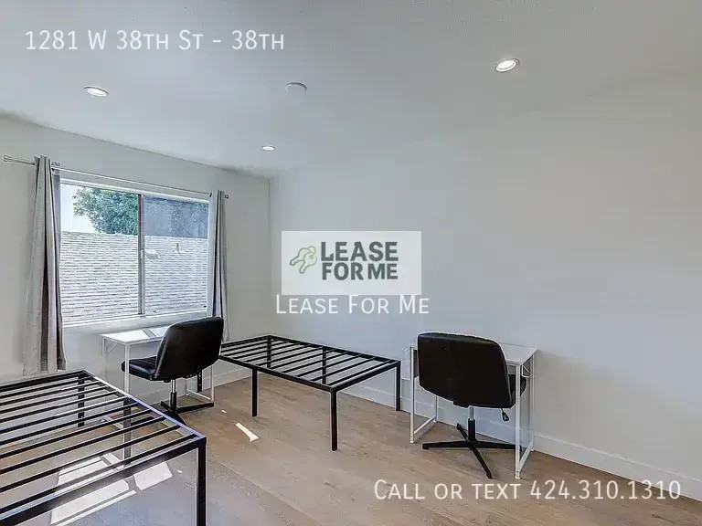 1281 W 38th St #38th - Photo 3 of 4