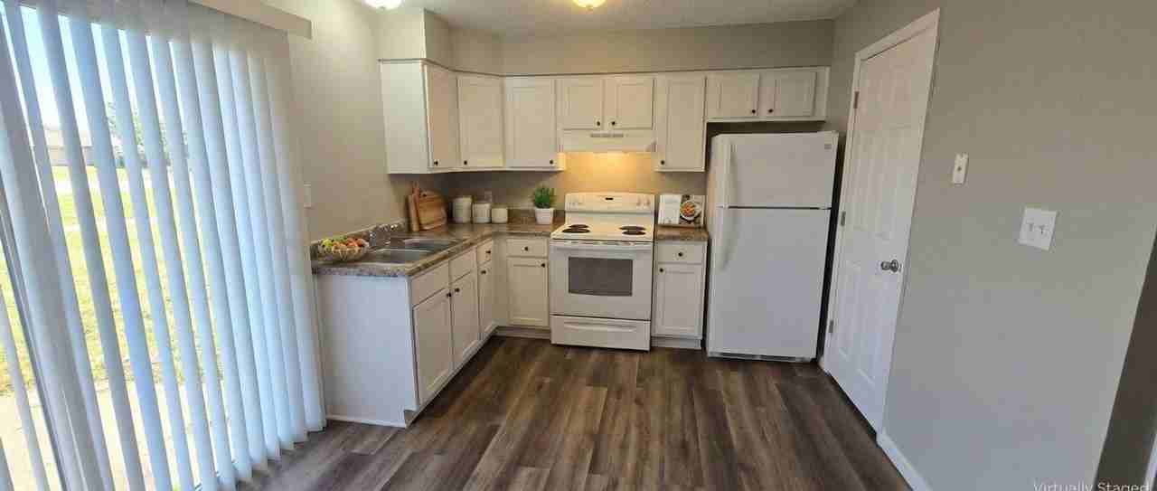 OAK TERRACE APARTMENTS - Photo 2 of 6