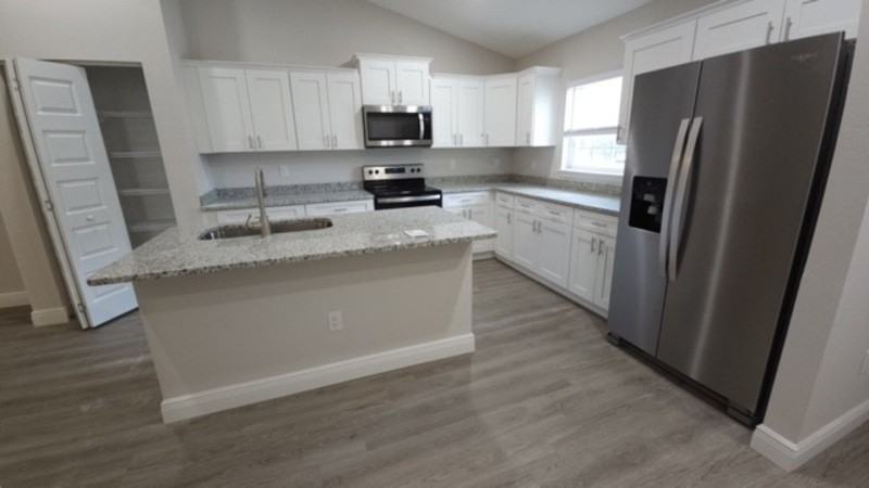 9093 N Peachtree Way - Photo 3 of 9