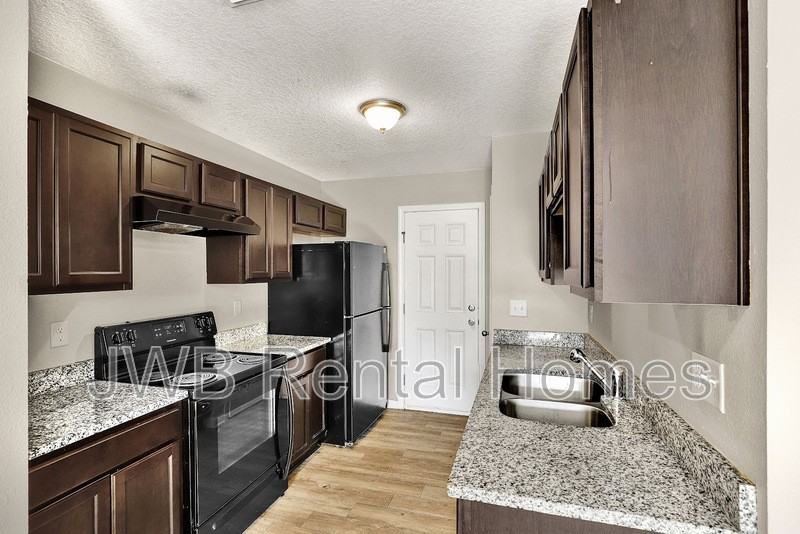 8964 3rd Ave - Photo 4 of 19