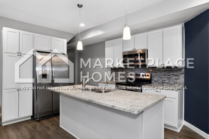 1011 Harlan St - Photo 5 of 28