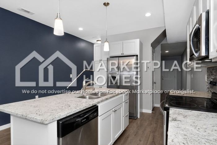 1011 Harlan St - Photo 6 of 28