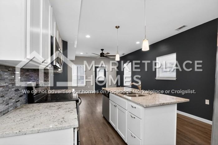 1011 Harlan St - Photo 7 of 28