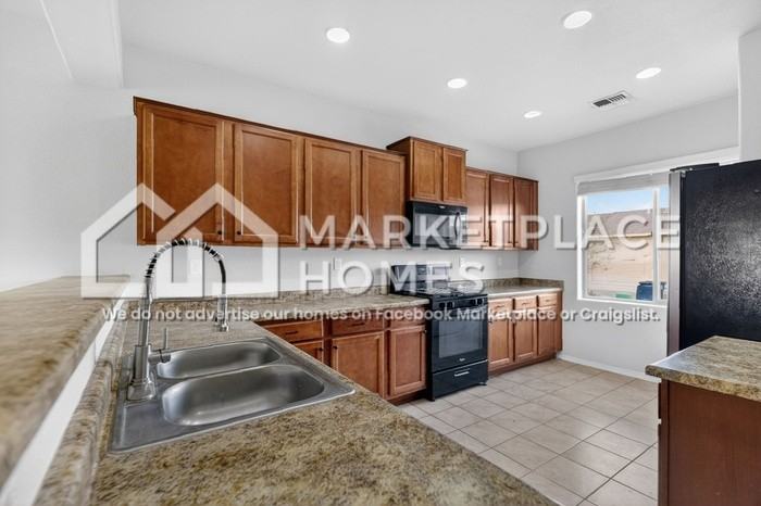 9808 Farinosa Ave Sw - Photo 6 of 32