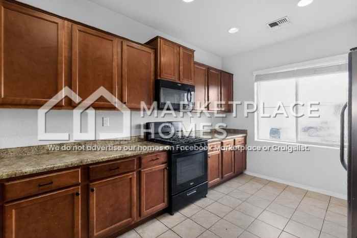 9808 Farinosa Ave Sw - Photo 7 of 32