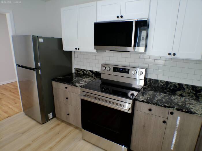 711 W 90th Ter - Photo 5 of 11