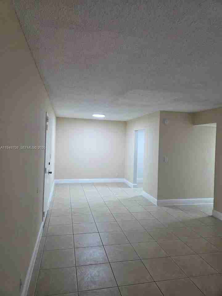 5221 Geneva Way #302 - Photo 6 of 11