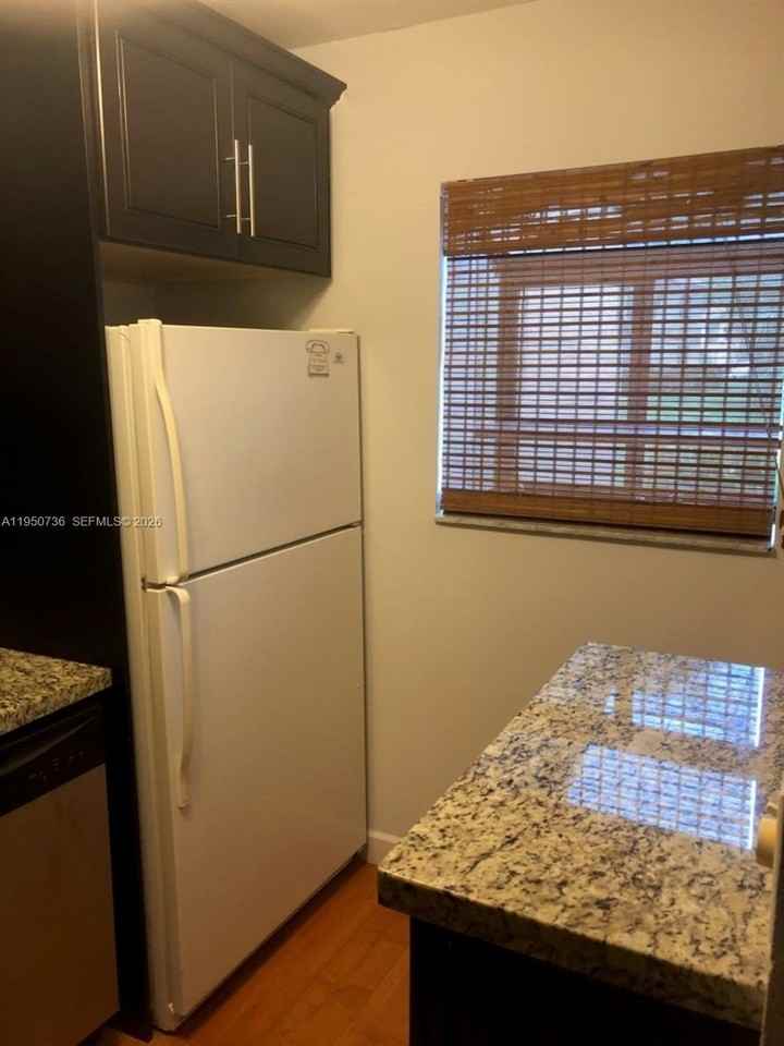 300 Gardens Dr #104 - Photo 2 of 9