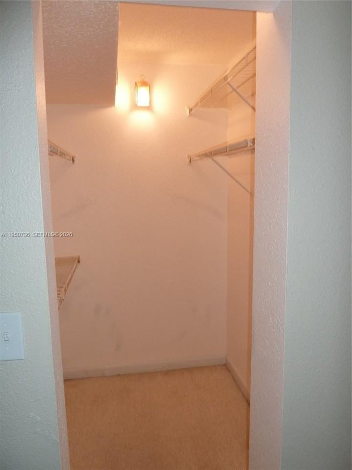 300 Gardens Dr #104 - Photo 7 of 9