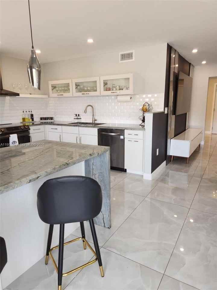 1075 92nd St #405 - Photo 7 of 26