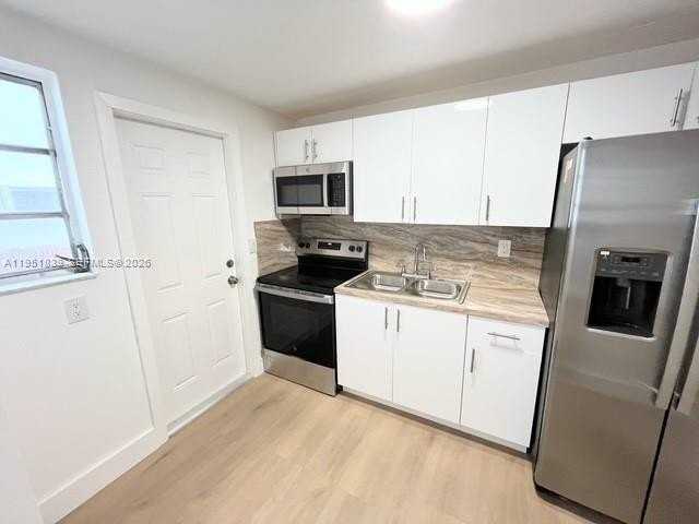 820 86th St #1-2 - Photo 7 of 11