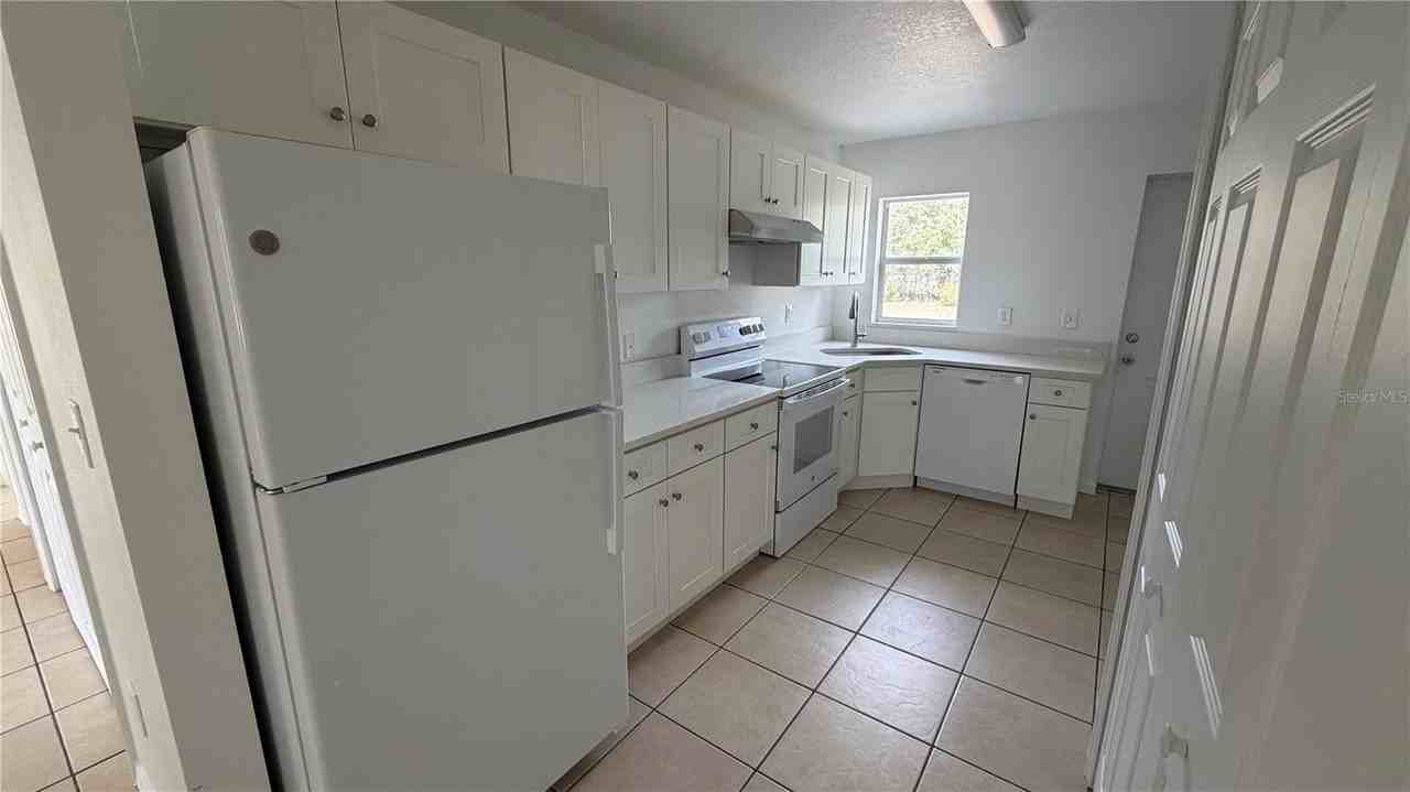 1928 Se Cherry Dr - Photo 6 of 7