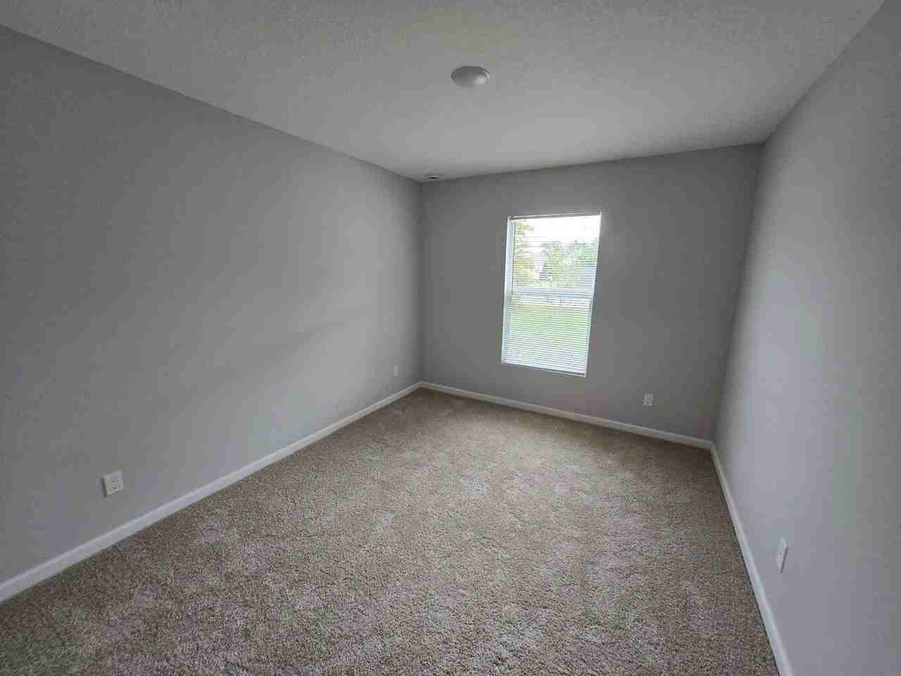 1240 Nw Antoch Ave - Photo 6 of 8