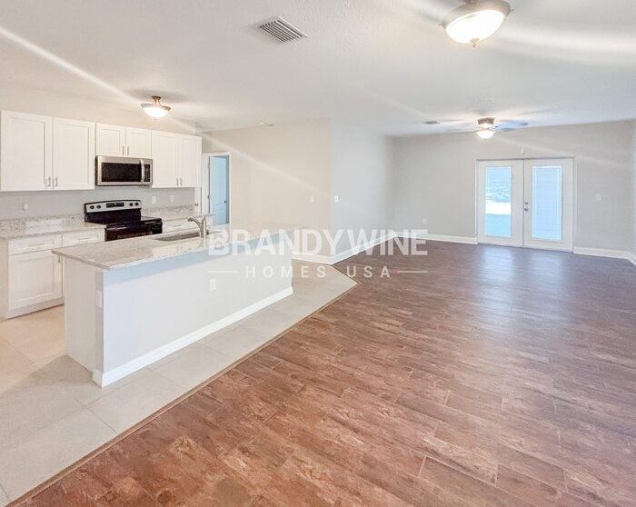 12026 Suburban Sunrise St - Photo 5 of 28