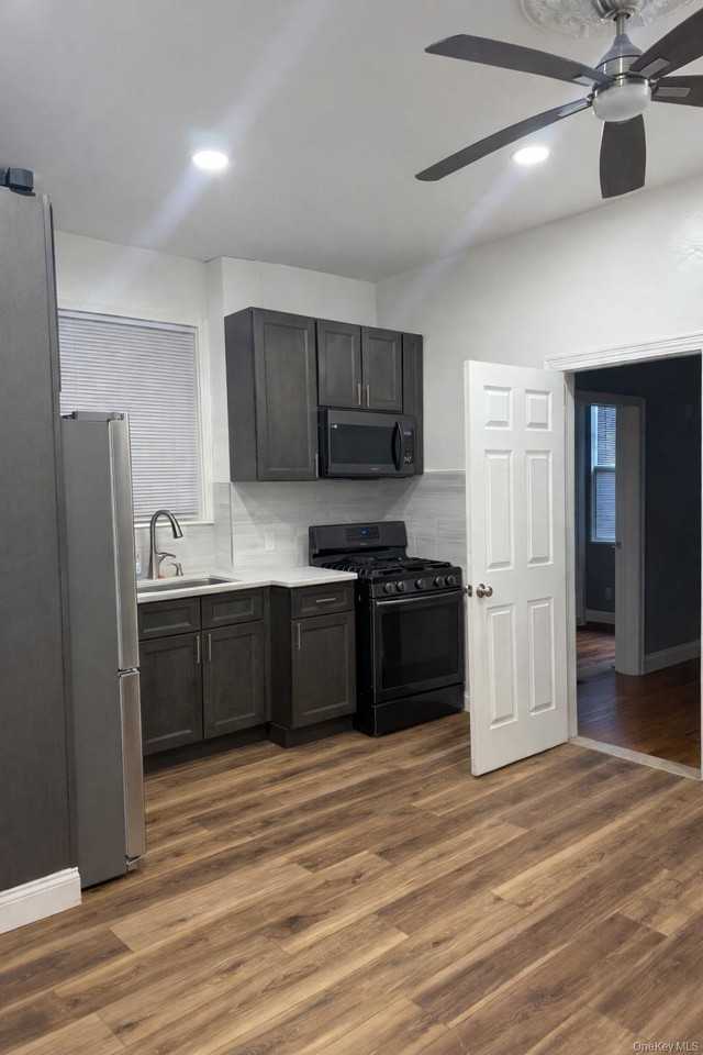 2162 Pitkin Ave Apt 1st #1stFL - Photo 2 of 9