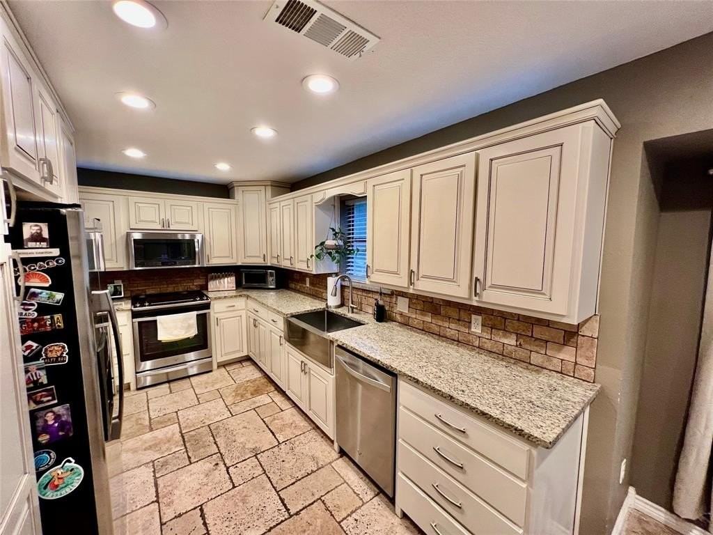 7812 Woodharbor Dr - Photo 2 of 35