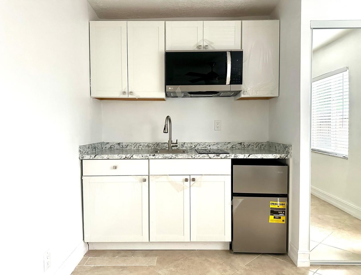 361 Ne 55th St #2 - Photo 5 of 7